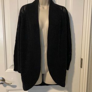 Candie’s black open knit cardigan